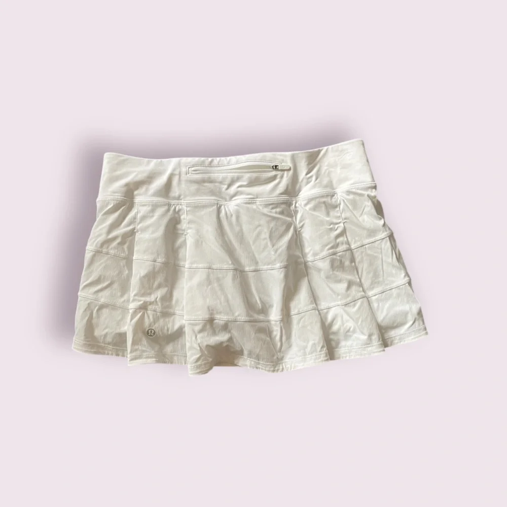 #094, Lululemon pace rival mid rise tennis skirt, size 8